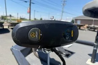 Slide: The Image of 2021 G3 Sportsman 1810 boat control panel with outdoor background. - 12