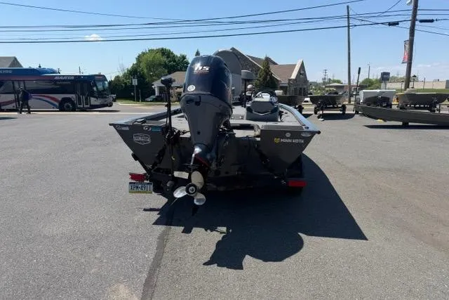 Slide: The Image of 2021 G3 Sportsman 1810 boat with motor, parked outdoors on a sunny day. - 4