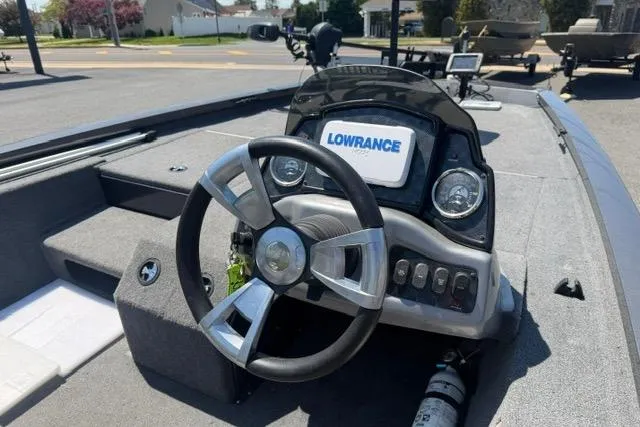 Slide: The Image of 2021 G3 Sportsman 1810 boat dashboard with Lowrance electronics and steering wheel. - 9