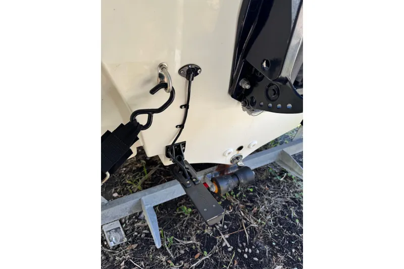 Slide: The Image of 2025 Mako Pro Skiff 19 CC boat trailer hitch and attachment detail. - 20