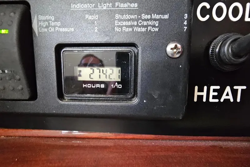 Slide: The Image of Hour meter reading 2742.1 on 2005 Neptunus 56 Flybridge control panel. - 28