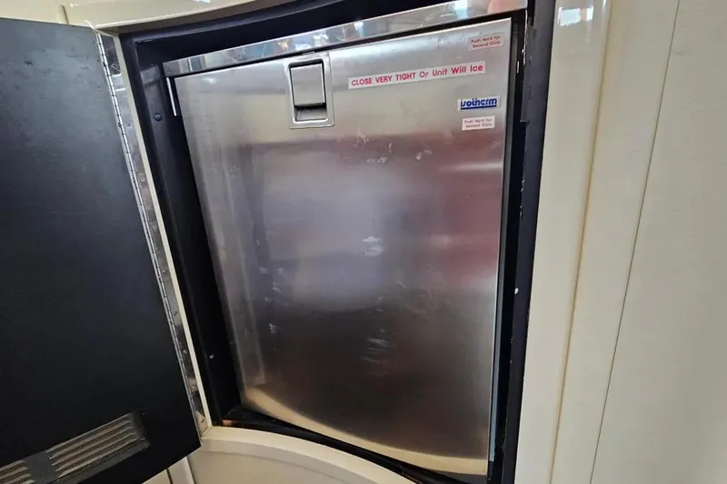 Slide: The Image of Stainless steel refrigerator on 2005 Neptunus 56 Flybridge yacht interior. - 29
