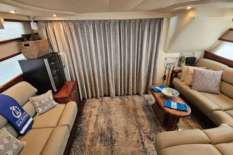 Slide: The Image of Luxurious interior of a 2005 Neptunus 56 Flybridge yacht with elegant seating and decor. - 33