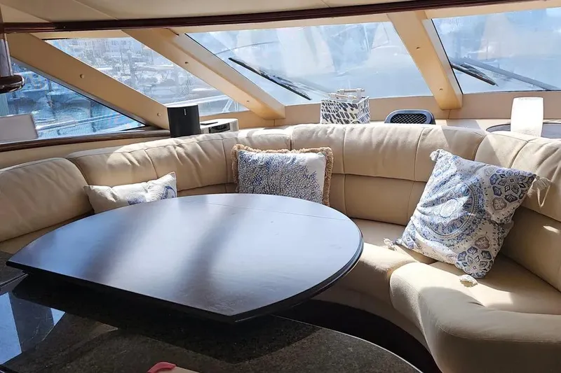 Slide: The Image of Luxurious interior of 2005 Neptunus 56 Flybridge yacht with plush seating and decorative pillows. - 42