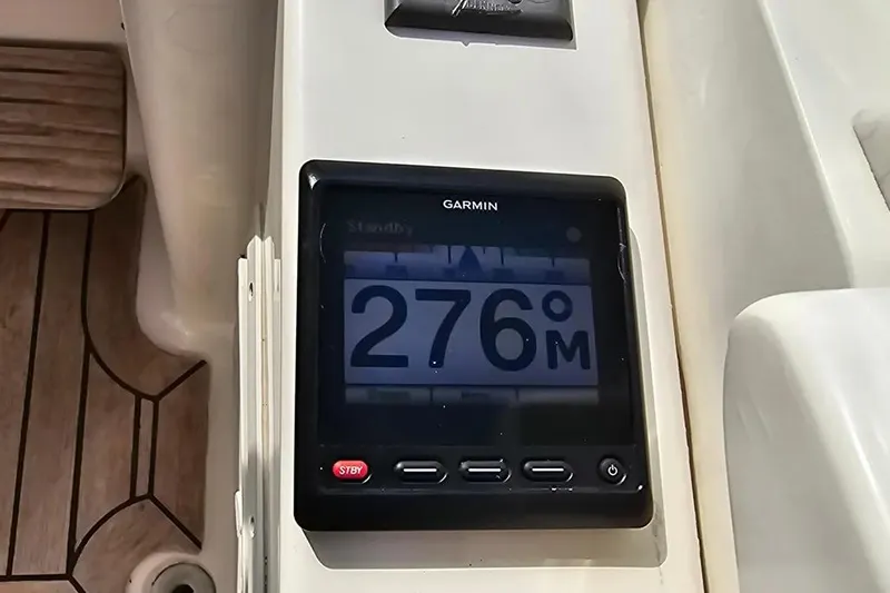 Slide: The Image of Garmin display on 2005 Neptunus 56 Flybridge showing 276 meters. - 52