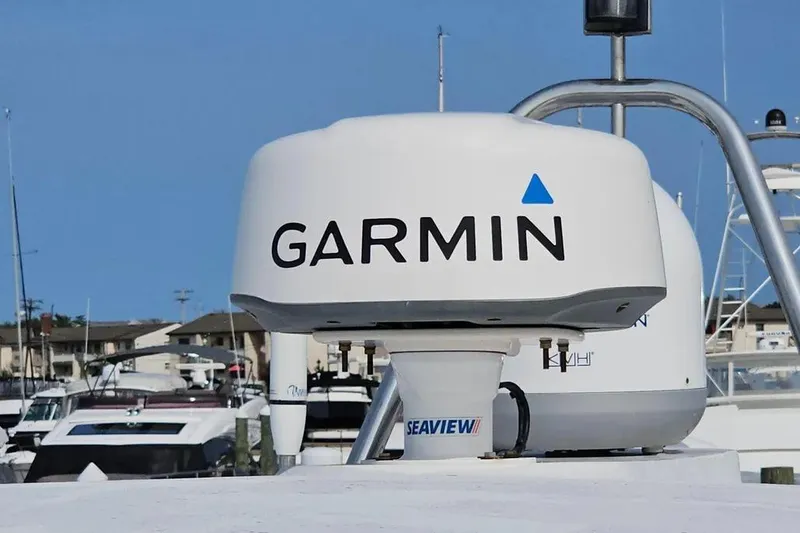 Slide: The Image of Garmin radar on 2005 Neptunus 56 Flybridge yacht at marina. - 57