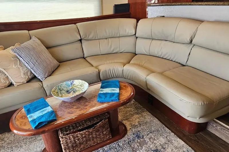 Slide: The Image of Luxurious beige leather seating in 2005 Neptunus 56 Flybridge yacht interior. - 59