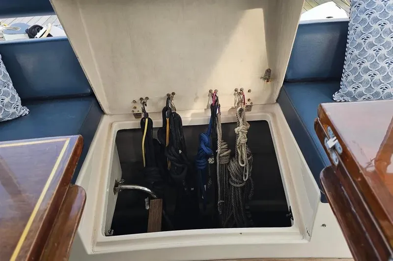 Slide: The Image of Storage compartment with ropes on a 2005 Neptunus 56 Flybridge yacht. - 60