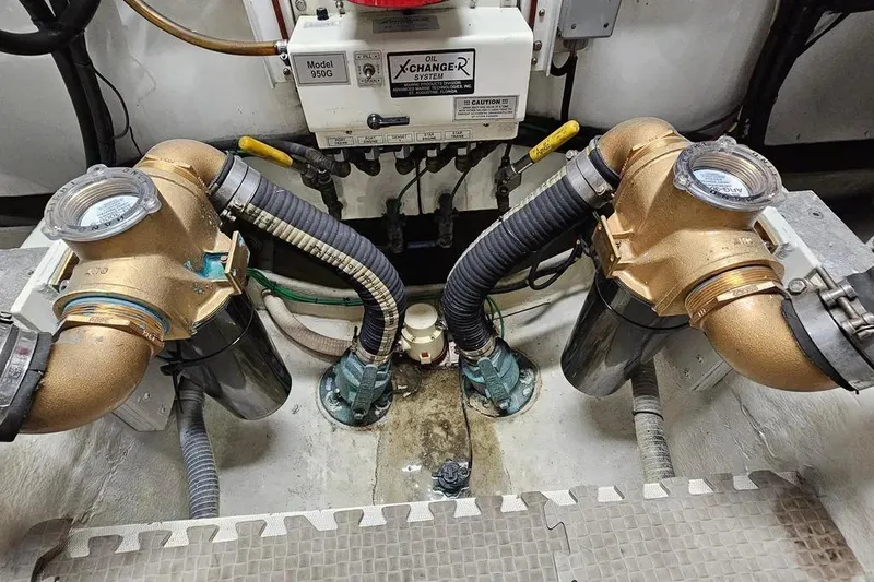 Slide: The Image of Engine room of 2005 Neptunus 56 Flybridge with X-Changer oil system and bronze fittings. - 69