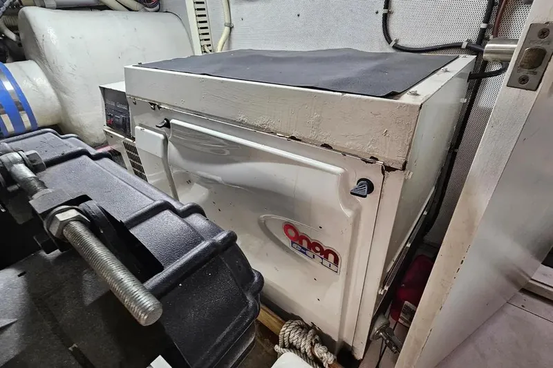 Slide: The Image of Engine room of 2005 Neptunus 56 Flybridge with Onan generator. - 71