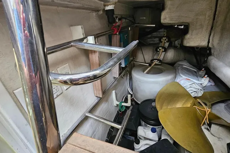 Slide: The Image of Engine room of a 2005 Neptunus 56 Flybridge yacht with propeller and equipment. - 74