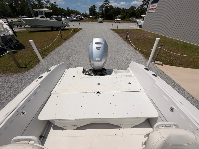 Slide: The Image of 2011 Triumph 191 FS boat with outboard motor. - 13