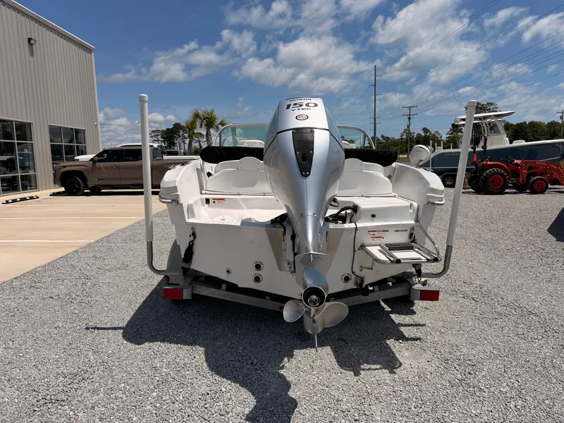 Slide: The Image of 2011 Triumph 191 FS boat with Honda 150 engine, on gravel lot. - 6