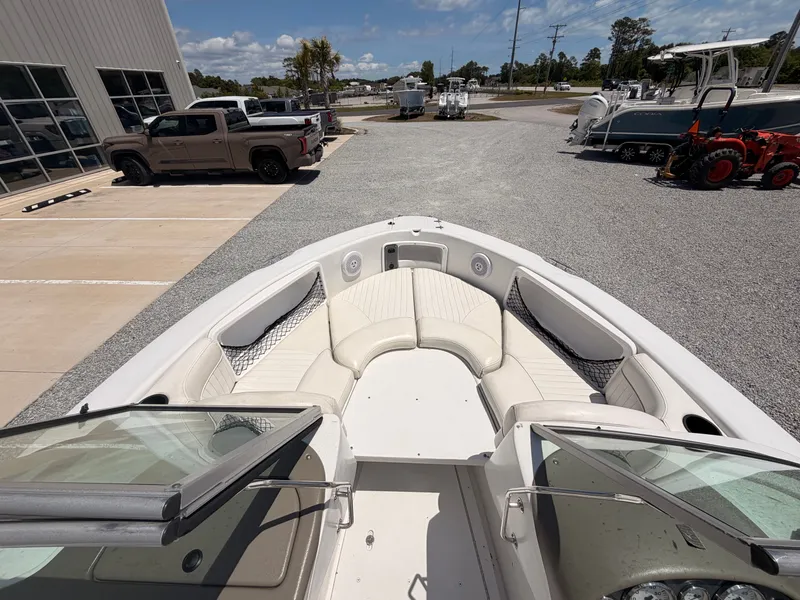 Slide: The Image of 2011 Triumph 191 FS boat parked in a lot. - 7