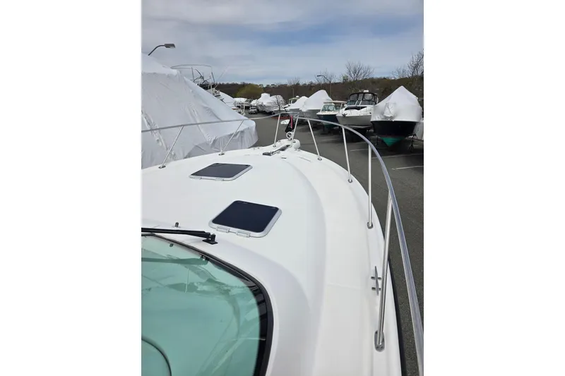 Slide: The Image of 2006 Tiara Yachts 3200 Open boat deck view in storage yard. - 14