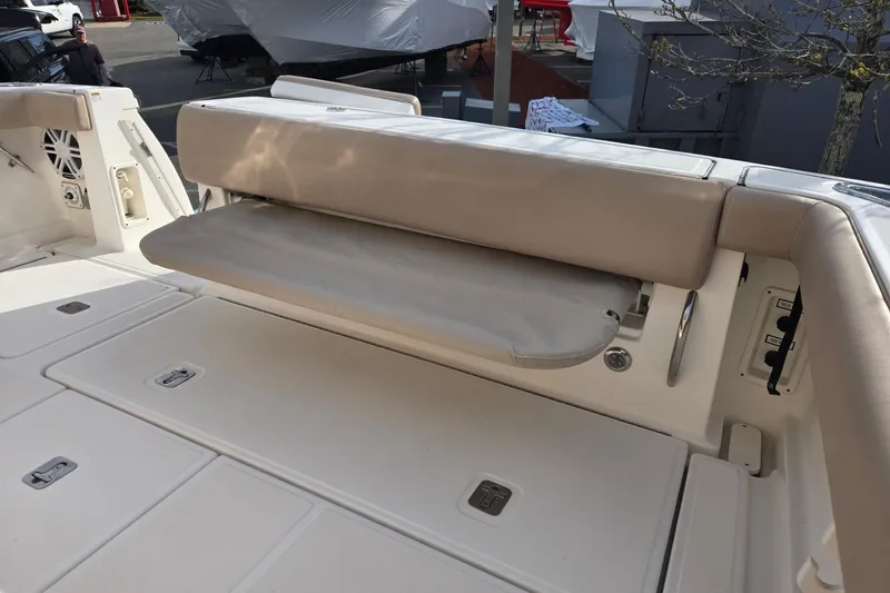 Slide: The Image of 2006 Tiara Yachts 3200 Open boat with foldable seating and storage compartments. - 15