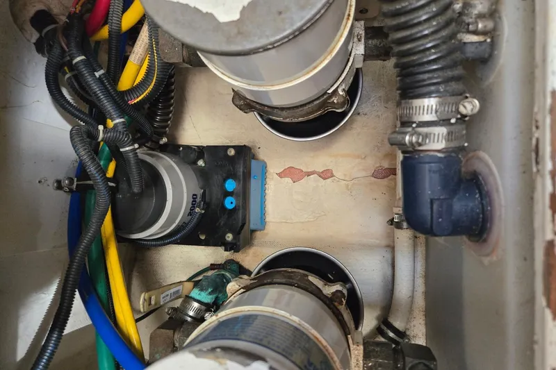 Slide: The Image of Engine compartment of a 2006 Tiara Yachts 3200 Open, showing wiring and components. - 44