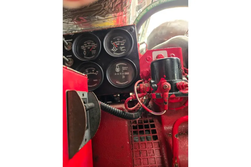 Slide: The Image of Engine gauges and components of a 2006 Tiara Yachts 3200 Open. - 48