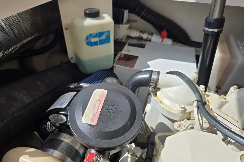 Slide: The Image of Engine compartment of a 2006 Tiara Yachts 3200 Open, showcasing mechanical components. - 52