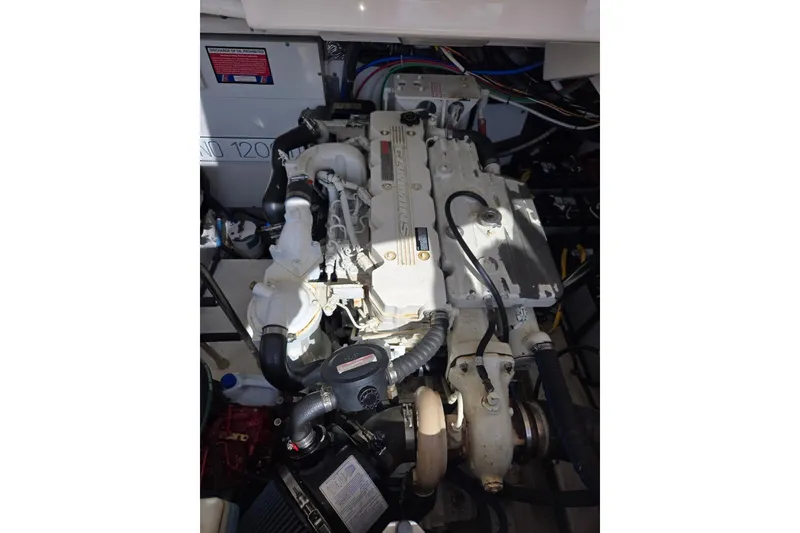 Slide: The Image of Engine compartment of a 2006 Tiara Yachts 3200 Open, showcasing detailed mechanical components. - 53