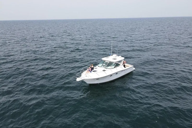Slide: The Image of 2006 Tiara Yachts 3200 Open cruising on open sea, aerial view. - 6