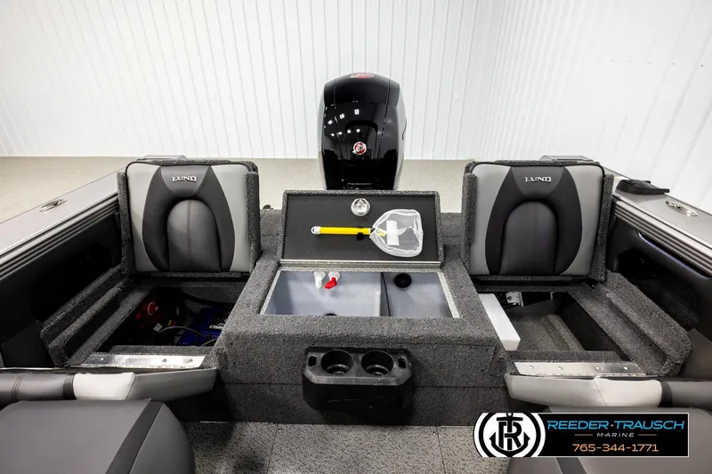 Slide: The Image of 2026 Lund 1875 Tyee boat interior with seating and storage compartments. - 18