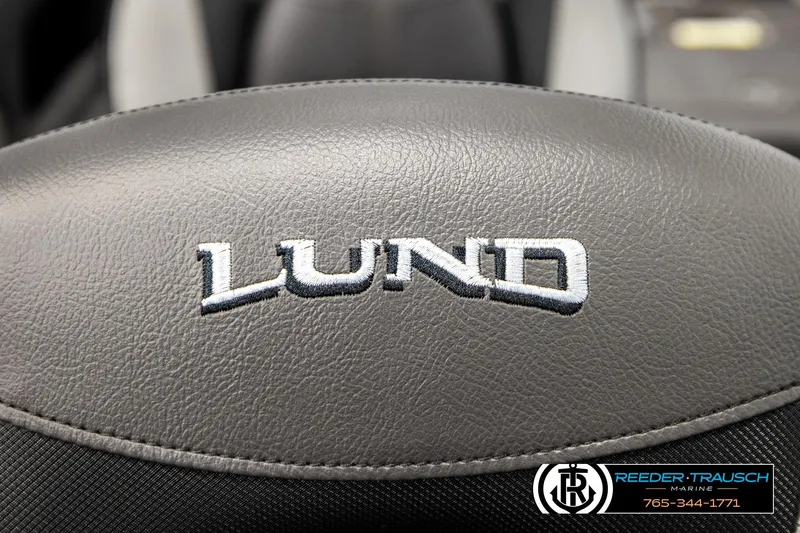 Slide: The Image of 2026 Lund 1875 Tyee boat seat with embroidered logo, Reeder-Trausch Marine branding. - 40
