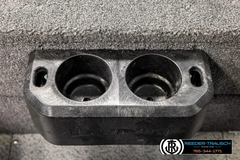 Slide: The Image of Cup holder in 2026 Lund 1875 Tyee boat, featuring durable black plastic design. - 44
