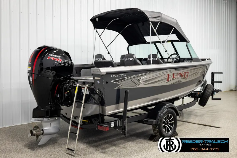 Slide: The Image of 2026 Lund 1875 Tyee boat with Mercury Pro XS engine in showroom. - 5