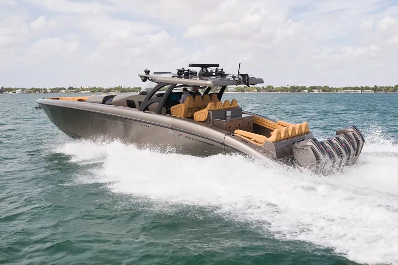 Slide: The Image of 2026 Midnight Express 52 Vitesse luxury speedboat cruising on open water. - 12
