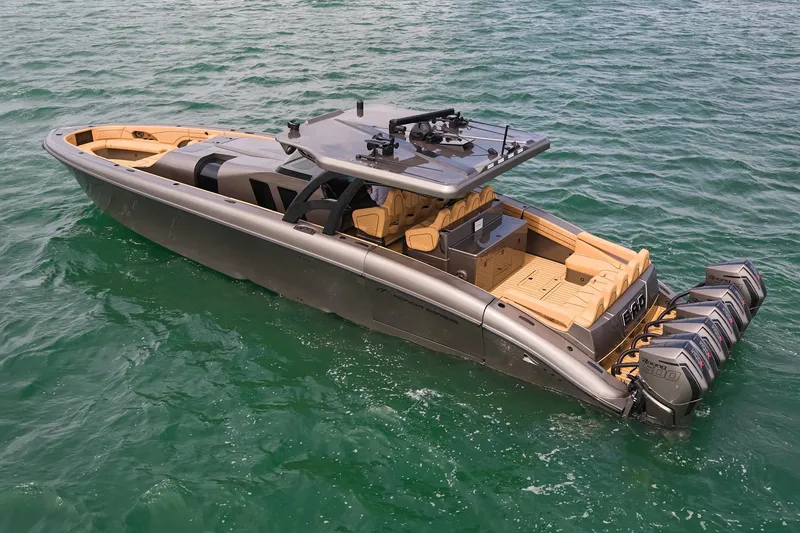 Slide: The Image of Luxury 2026 Midnight Express 52 Vitesse yacht on open water, featuring sleek design and powerful engines. - 16
