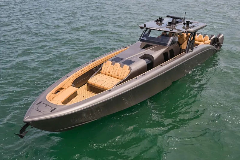Slide: The Image of 2026 Midnight Express 52 Vitesse luxury boat cruising on open water. - 17