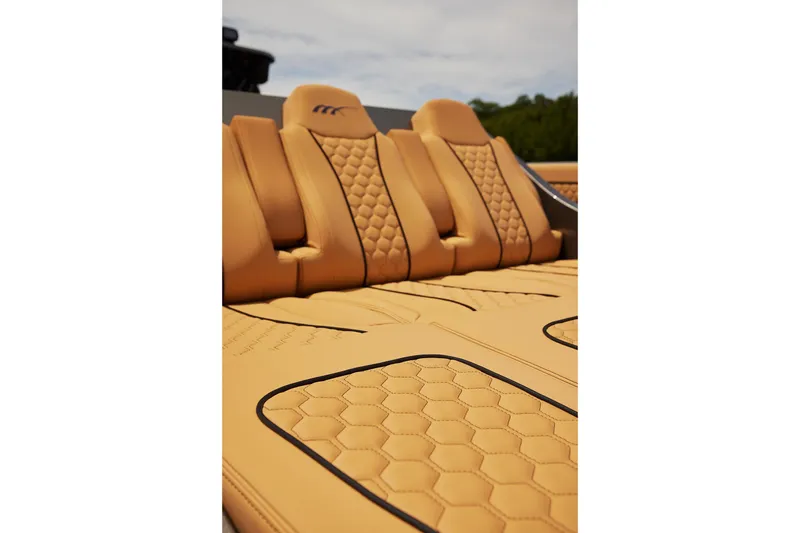 Slide: The Image of Luxurious tan leather seating in 2026 Midnight Express 52 Vitesse boat. - 28