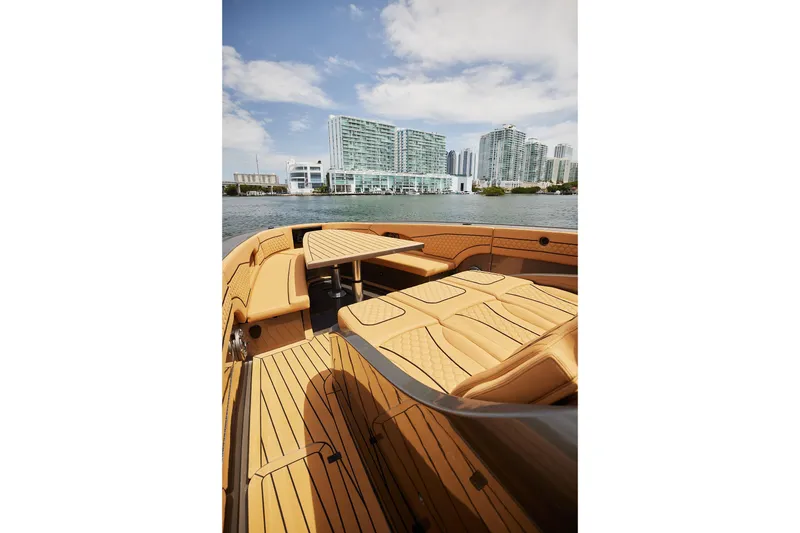 Slide: The Image of Luxurious 2026 Midnight Express 52 Vitesse yacht interior with city skyline backdrop. - 30