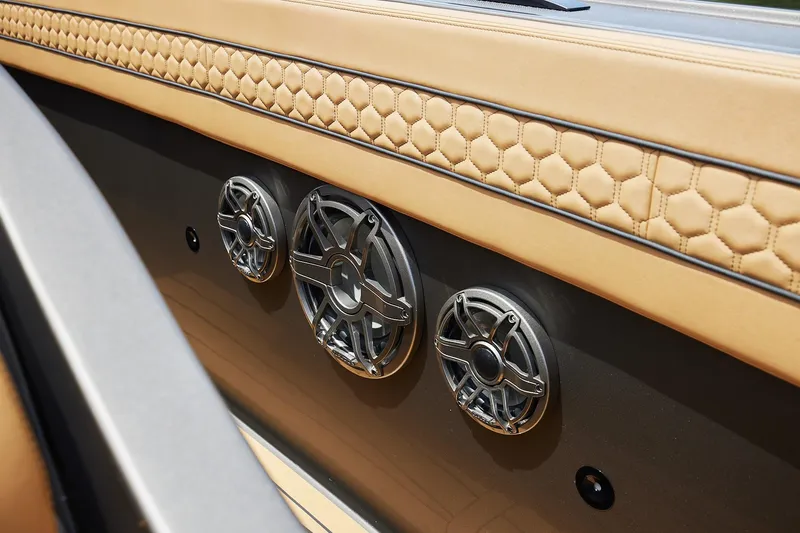 Slide: The Image of Luxurious interior of 2026 Midnight Express 52 Vitesse with premium speakers and quilted leather detailing. - 31