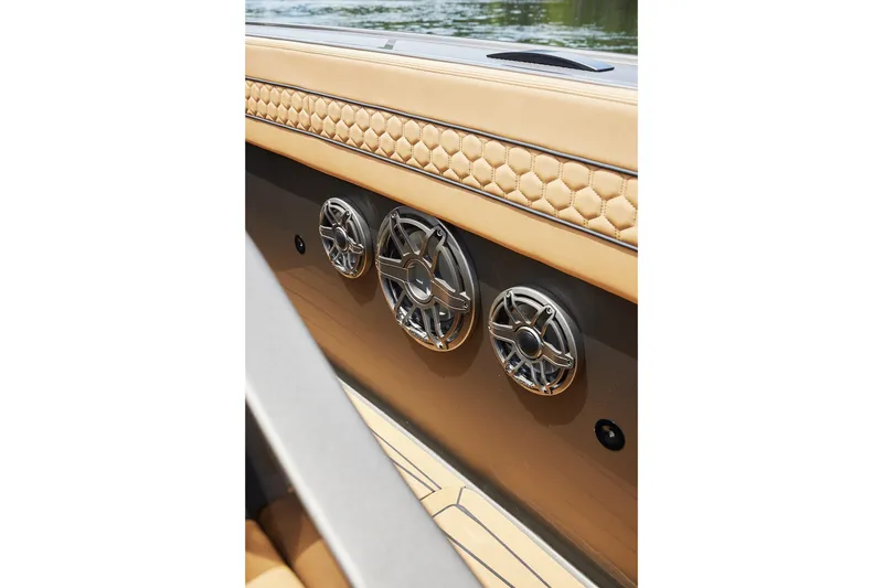 Slide: The Image of Luxurious interior of 2026 Midnight Express 52 Vitesse with premium speakers and quilted leather. - 32