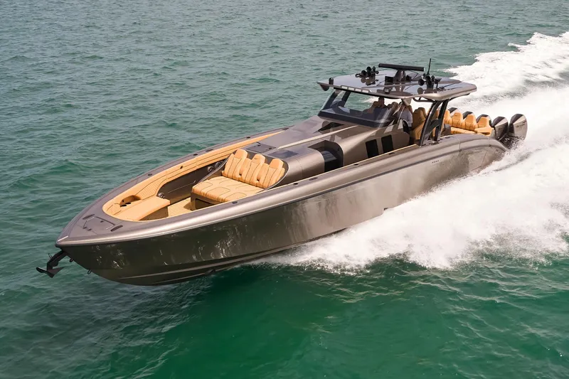 Slide: The Image of 2026 Midnight Express 52 Vitesse luxury speedboat cruising on open water. - 4