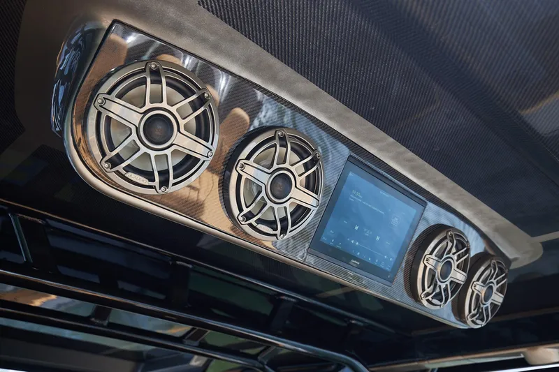 Slide: The Image of Audio system and display in 2026 Midnight Express 52 Vitesse boat interior. - 46