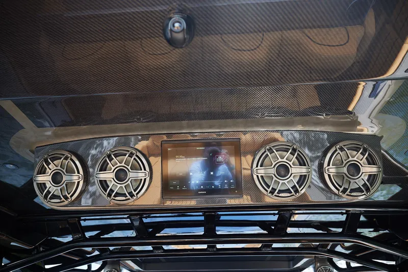 Slide: The Image of High-tech audio system in 2026 Midnight Express 52 Vitesse boat, featuring sleek speakers and touchscreen display. - 47