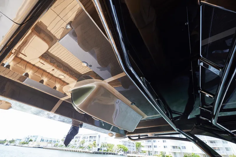 Slide: The Image of Underneath view of a 2026 Midnight Express 52 Vitesse boat, showcasing sleek design and structure. - 48