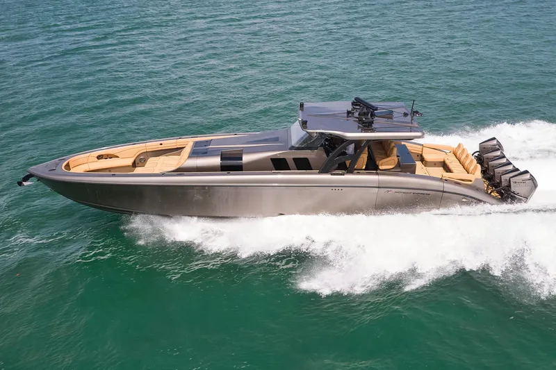 Slide: The Image of 2026 Midnight Express 52 Vitesse luxury boat cruising on open water. - 5