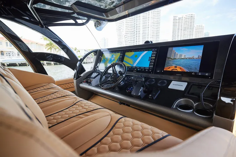 Slide: The Image of Luxurious interior of 2026 Midnight Express 52 Vitesse yacht with advanced navigation displays. - 55