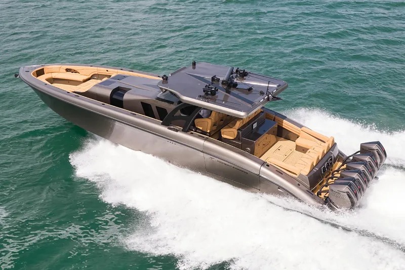 Slide: The Image of 2026 Midnight Express 52 Vitesse luxury boat cruising on open water. - 6