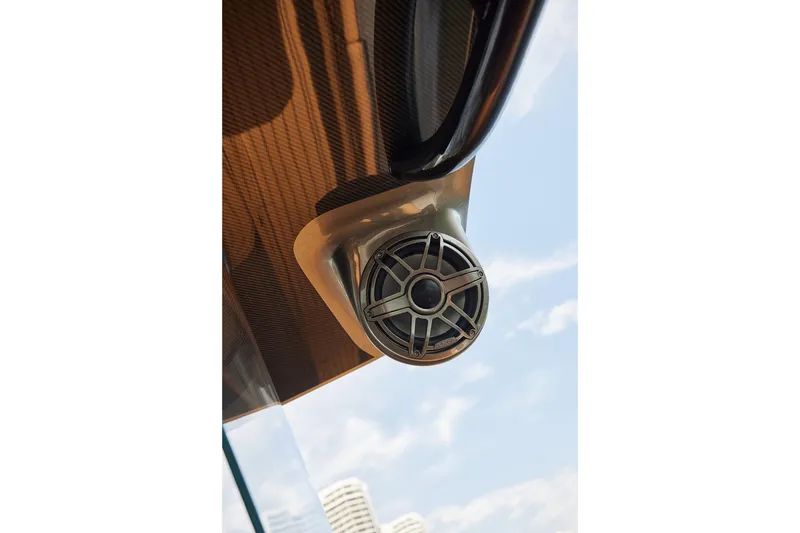 Slide: The Image of Speaker detail on 2026 Midnight Express 52 Vitesse boat, against a clear sky background. - 61