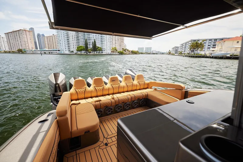 Slide: The Image of Luxurious 2026 Midnight Express 52 Vitesse yacht interior with waterfront cityscape view. - 62