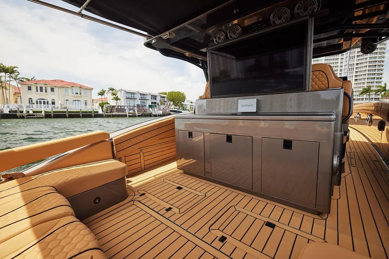 Slide: The Image of Luxurious interior of 2026 Midnight Express 52 Vitesse yacht with elegant seating and modern amenities. - 64