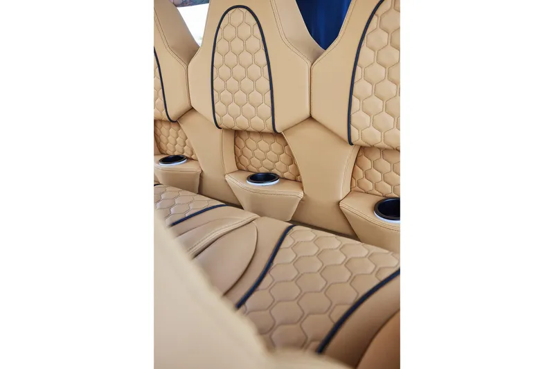 Slide: The Image of Luxurious beige leather seats with hexagonal stitching in 2026 Midnight Express 52 Vitesse. - 67