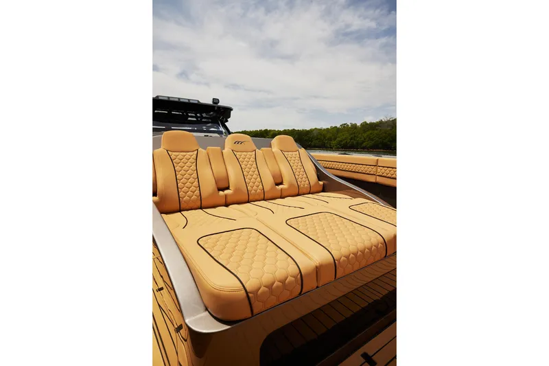 Slide: The Image of Luxurious tan seating on 2026 Midnight Express 52 Vitesse boat, showcasing elegant design. - 69