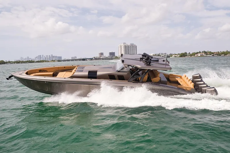 Slide: The Image of 2026 Midnight Express 52 Vitesse luxury boat cruising on open water. - 7