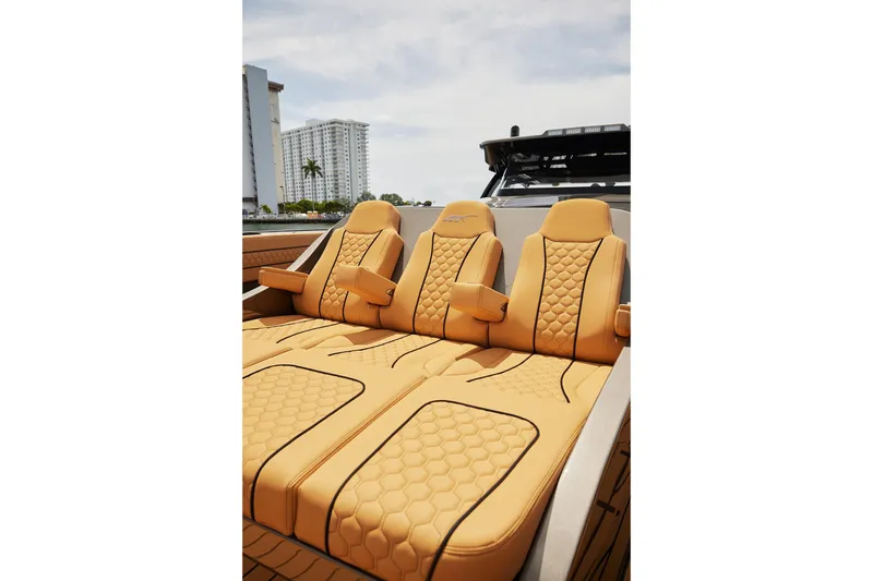 Slide: The Image of Luxurious tan seating on 2026 Midnight Express 52 Vitesse boat, featuring modern design and comfort. - 71